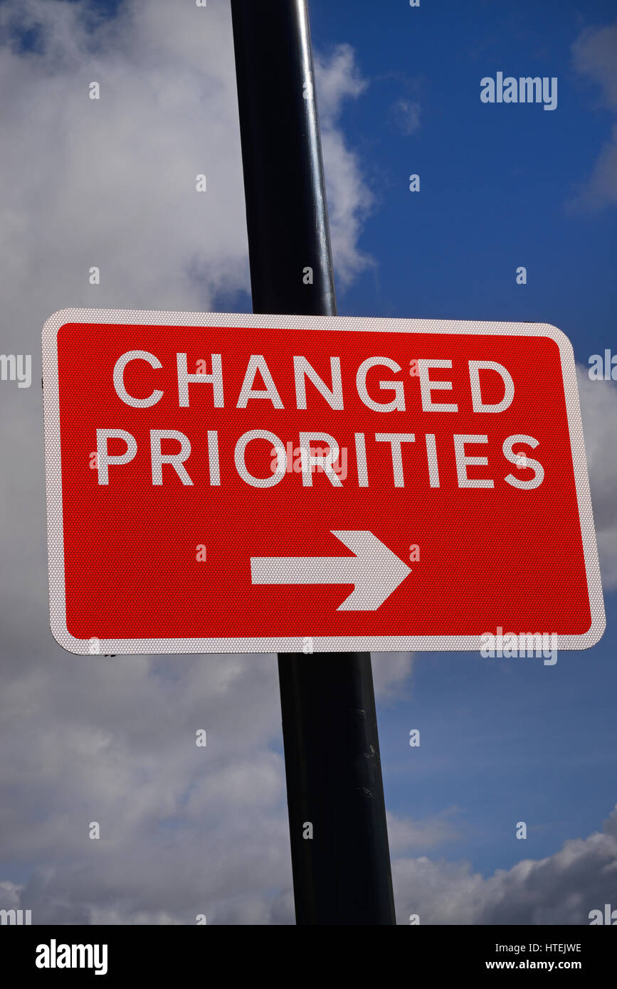 changed priorities road sign united kingdom Stock Photo