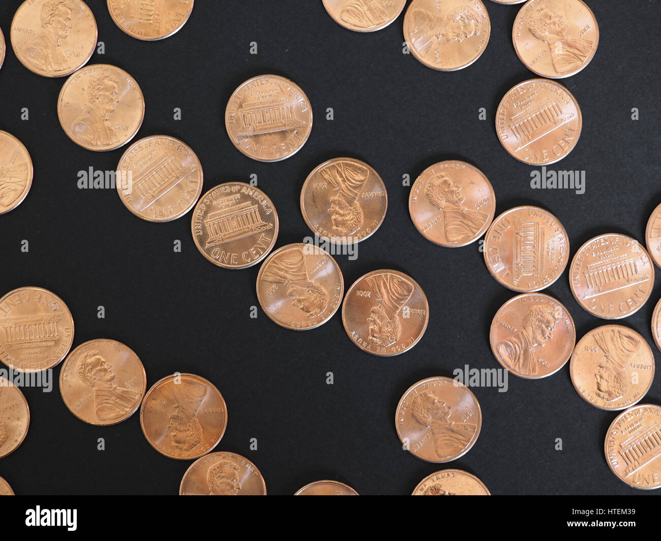 One Cent Dollar coins money (USD), currency of United States over black ...
