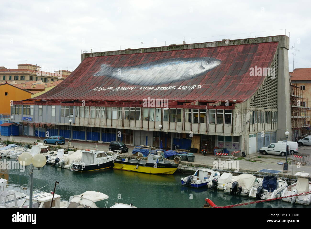 Lische Squame Coda. Amore - The huge sardine mural painting on the roof -  Old industrial fish market legal graffiti - Livorno, Tuscany, Italy, Europe  Stock Photo - Alamy