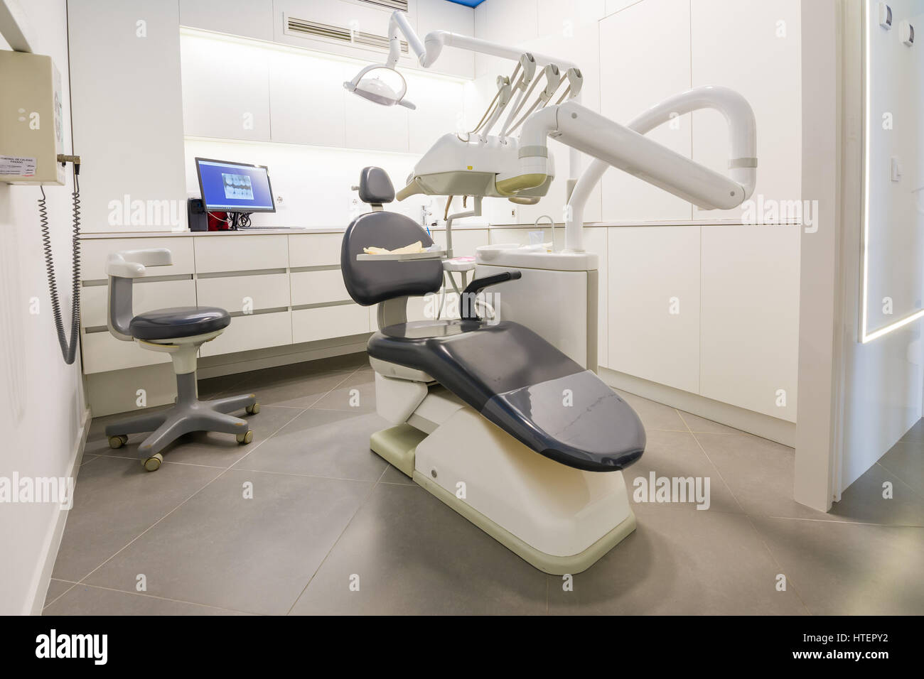 Dental clinic cabinet with dental chair Stock Photo