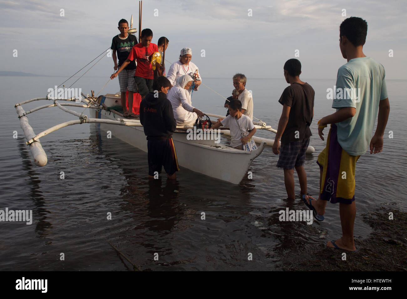 religious procession by the sea Stock Photo Alamy