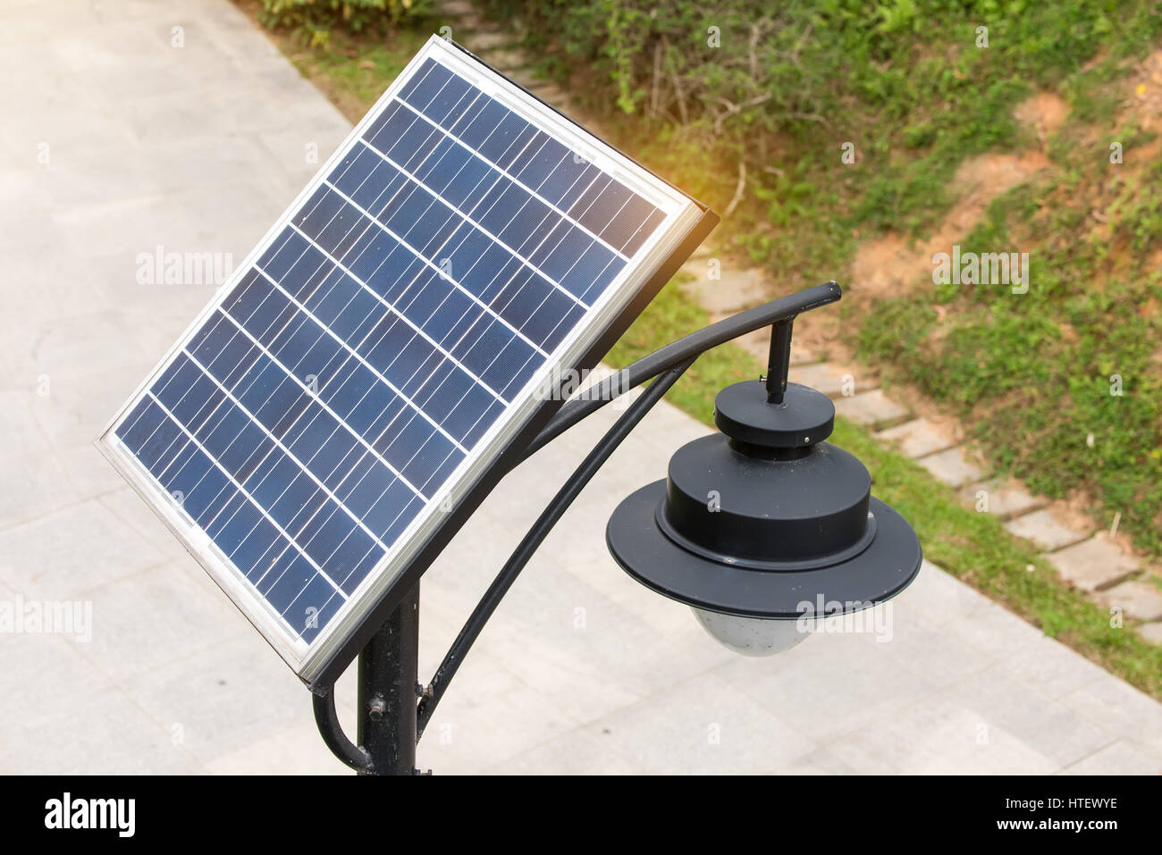 street lamp post with solar panel energy Stock Photo - Alamy