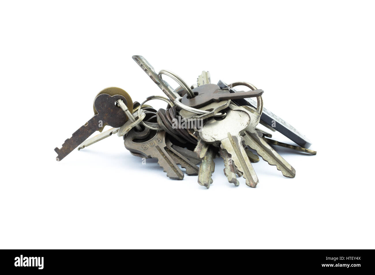 Old key isolated on white background Stock Photo - Alamy