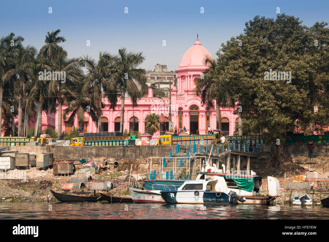 DHAKA, BANGLADESH - FEBRUARY 2017: The pink palace of Ashan Manjil seen from the river in Sadarghat, the old center of Dhaka in Bangladesh Stock Photo