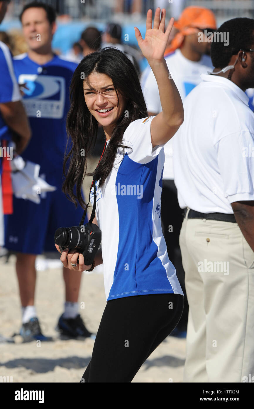 Jessica Szohr takes photos of the fans at the DIRECTV 4th Annual Celebrity Beach Bowl on February 6, 2010 in Miami Beach, Florida Stock Photo