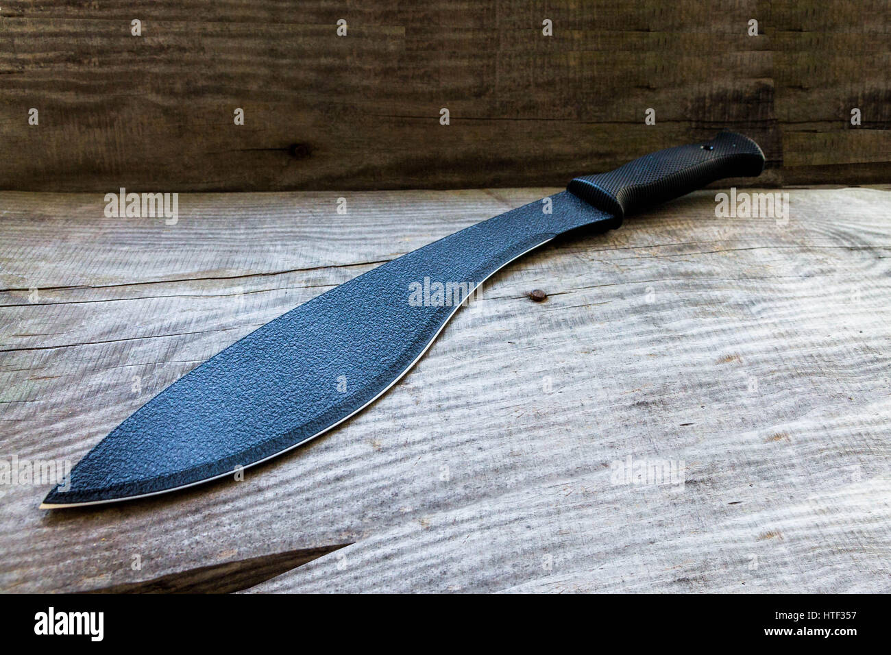 Kukri. Large knife. Machete. Large knife for rural work. Knife for cutting brushwood. Stock Photo