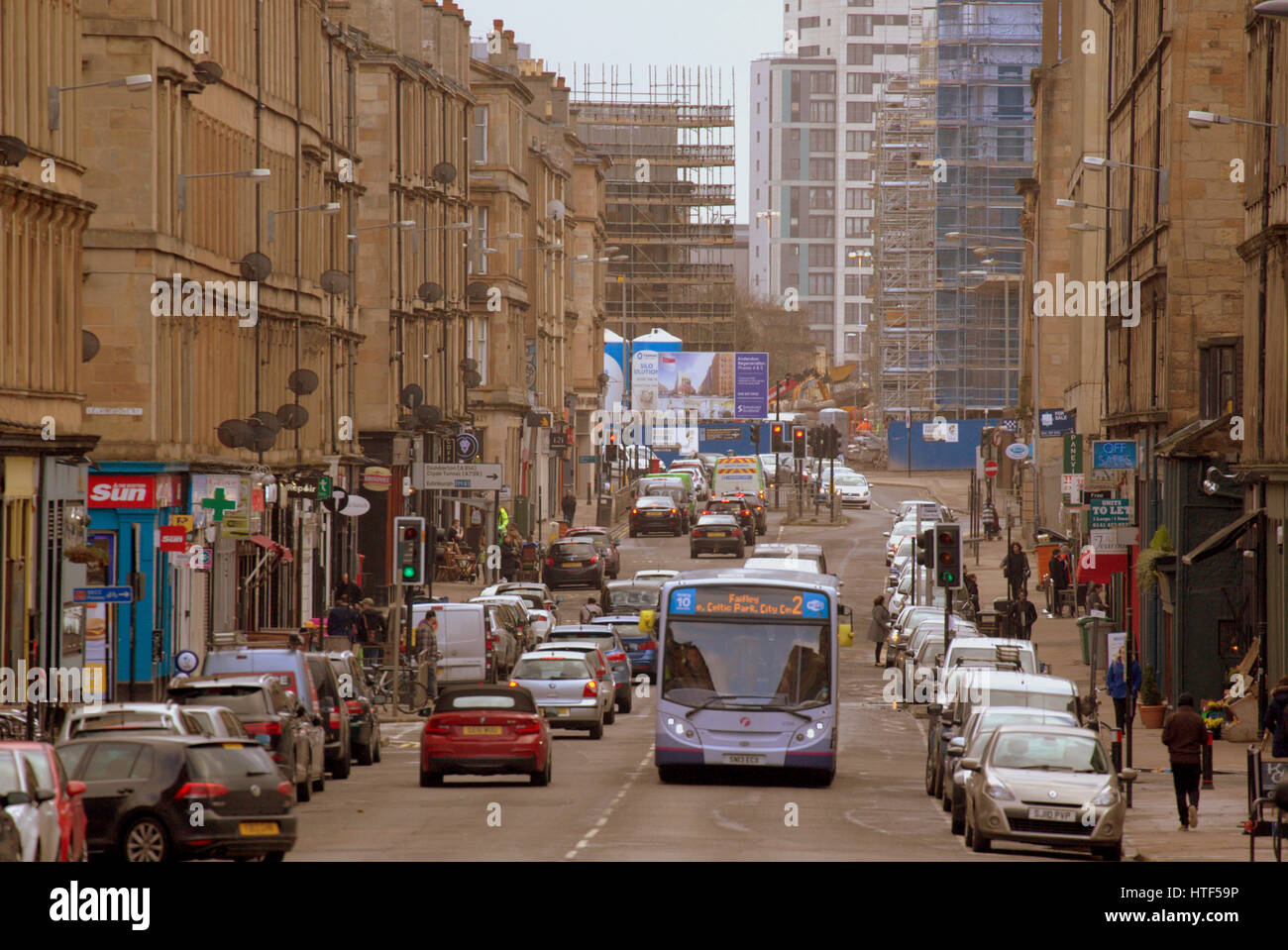 Glasgow finnieston the gentrified area of the city  firstbus bus  streetscene Stock Photo