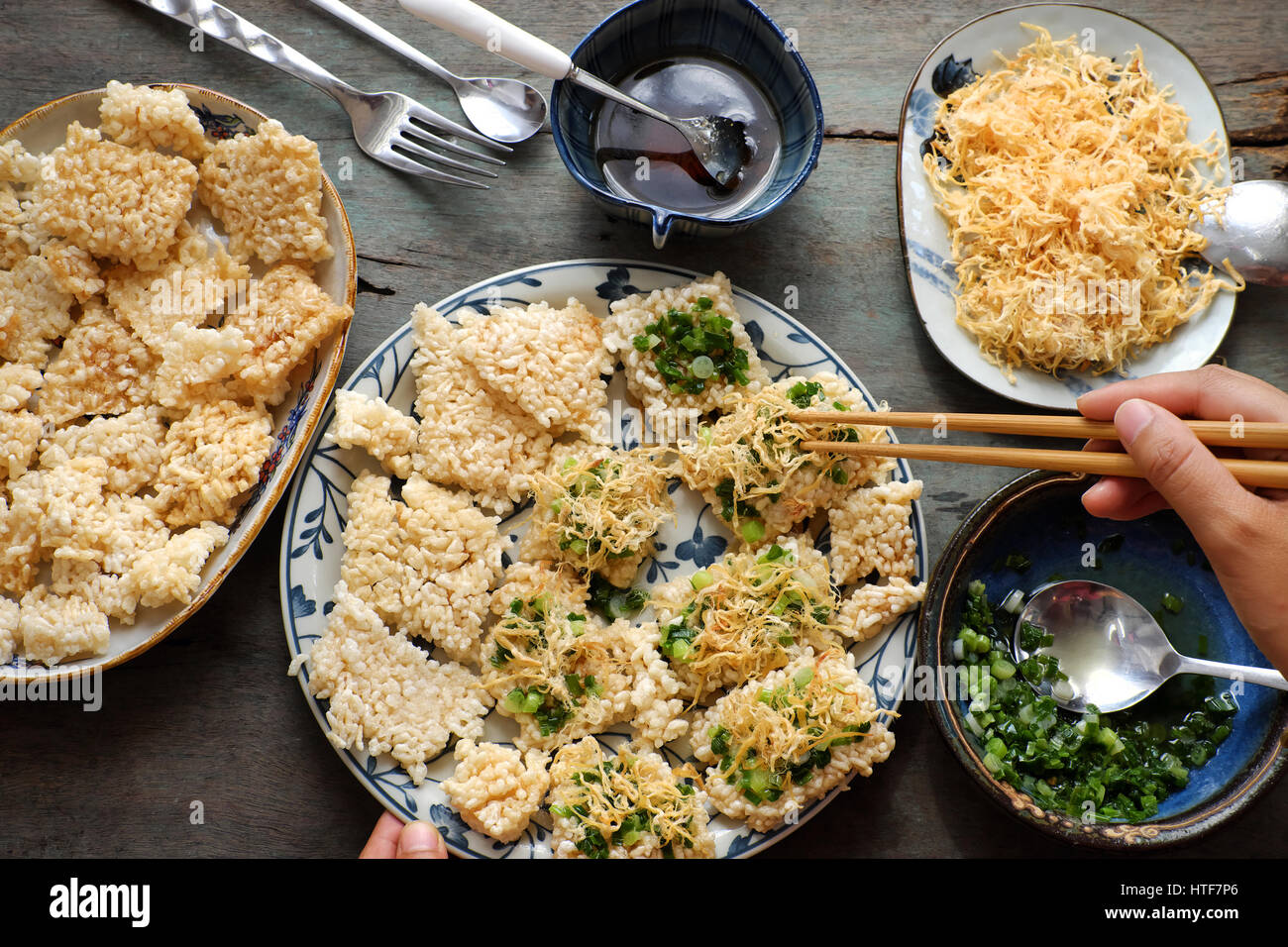 Vietnamese street food, fried dried rice with pork floss, name is com