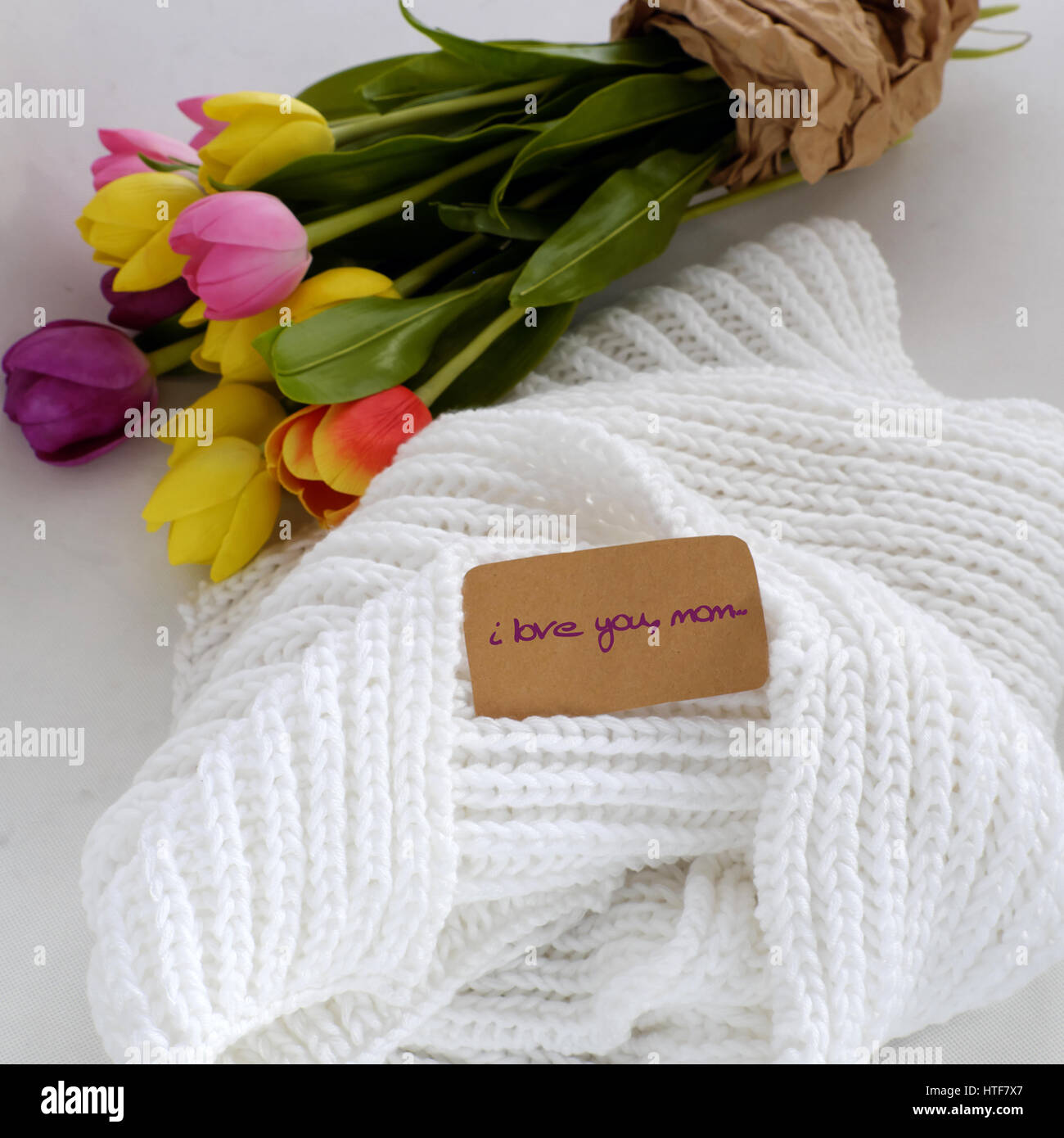 Happy mother day, meaningful handmade gift with knitted white scarf, tulip flower bouquet from clay, gratitude and thank mom for love in special day Stock Photo