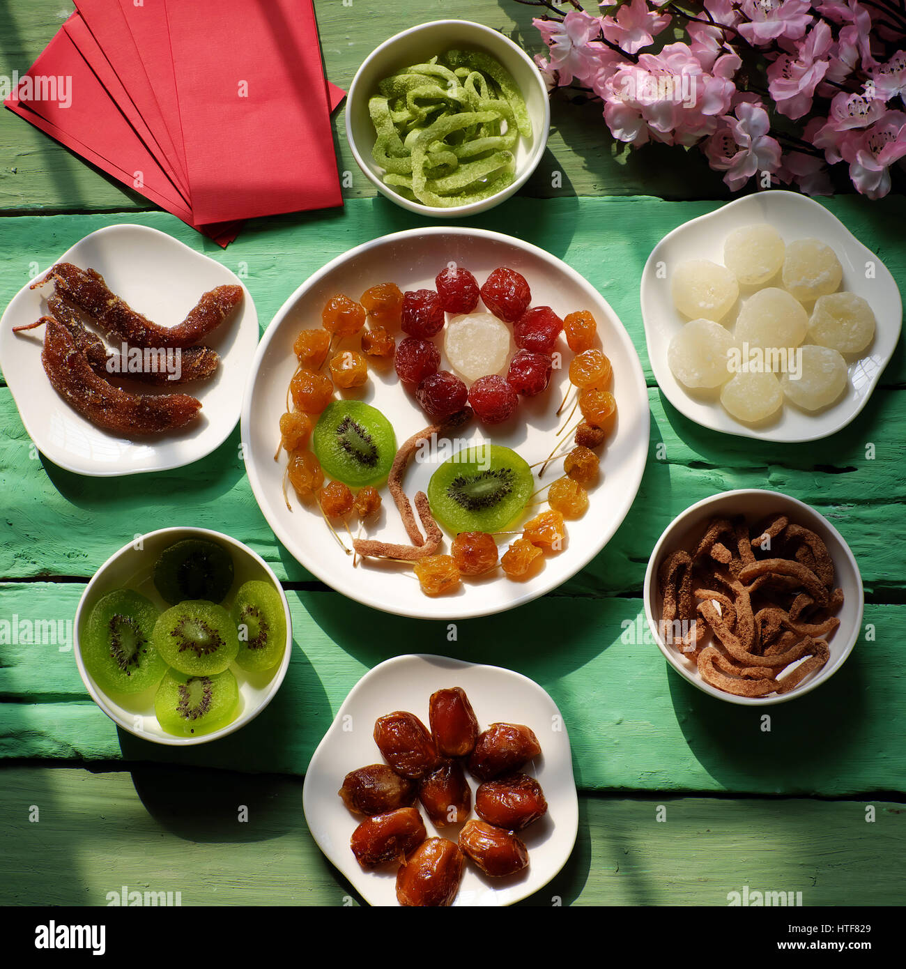 Colorful Vietnamese Jam For Vietnam Tet Holiday On Green Background Asia Lunar New Year Traditional Preserved Fruit From Kiwi Damson Coconut Jam Stock Photo Alamy