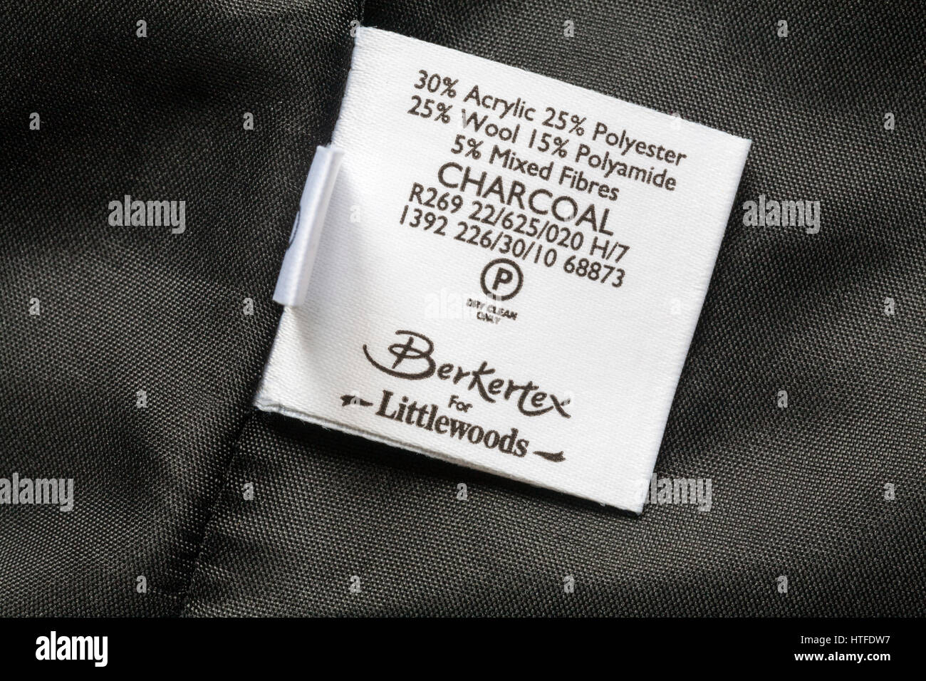 Label showing contents in charcoal coloured jacket by Berkertex for  Littlewoods Stock Photo - Alamy