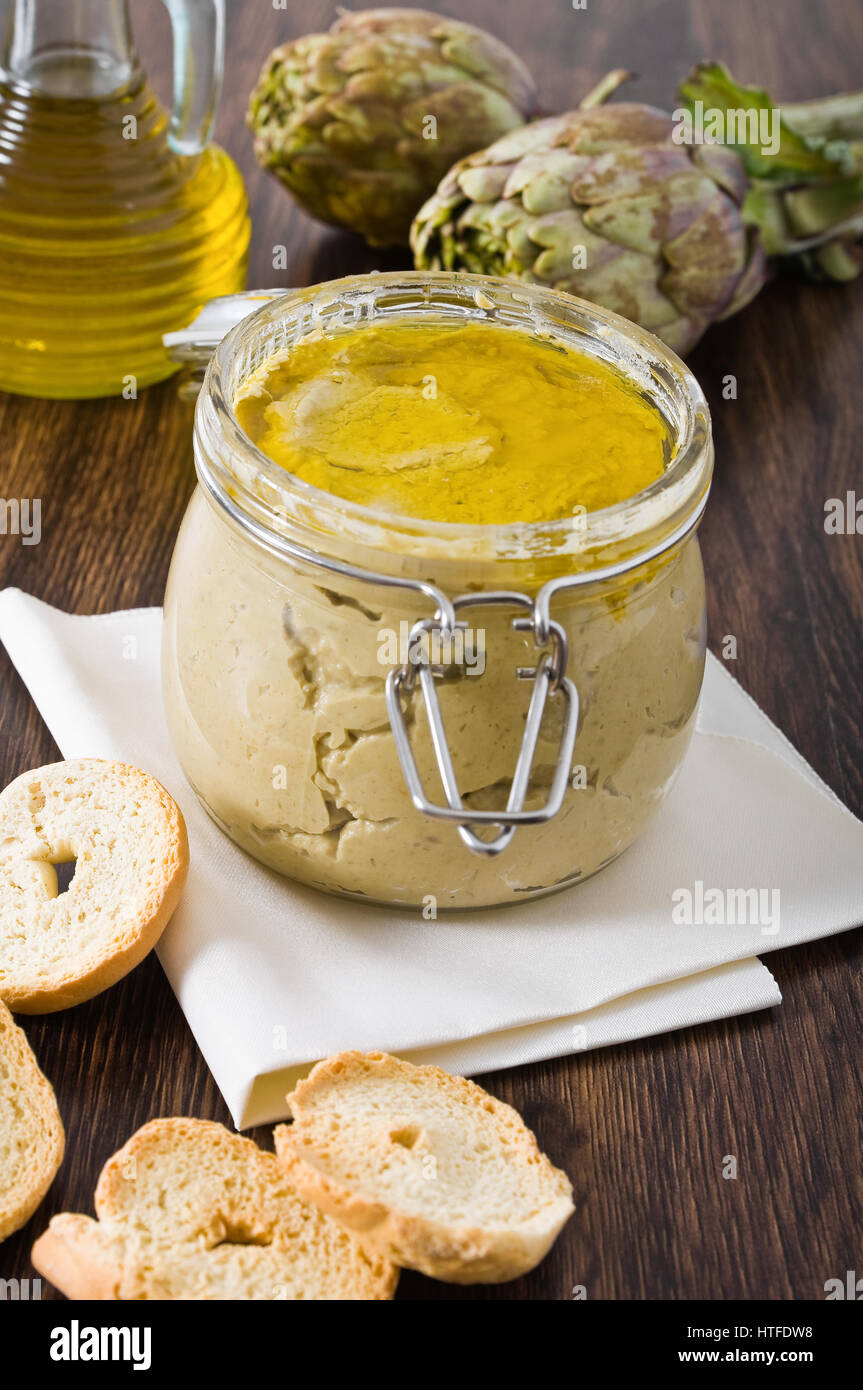 Artichoke pesto in glass jar Stock Photo Alamy
