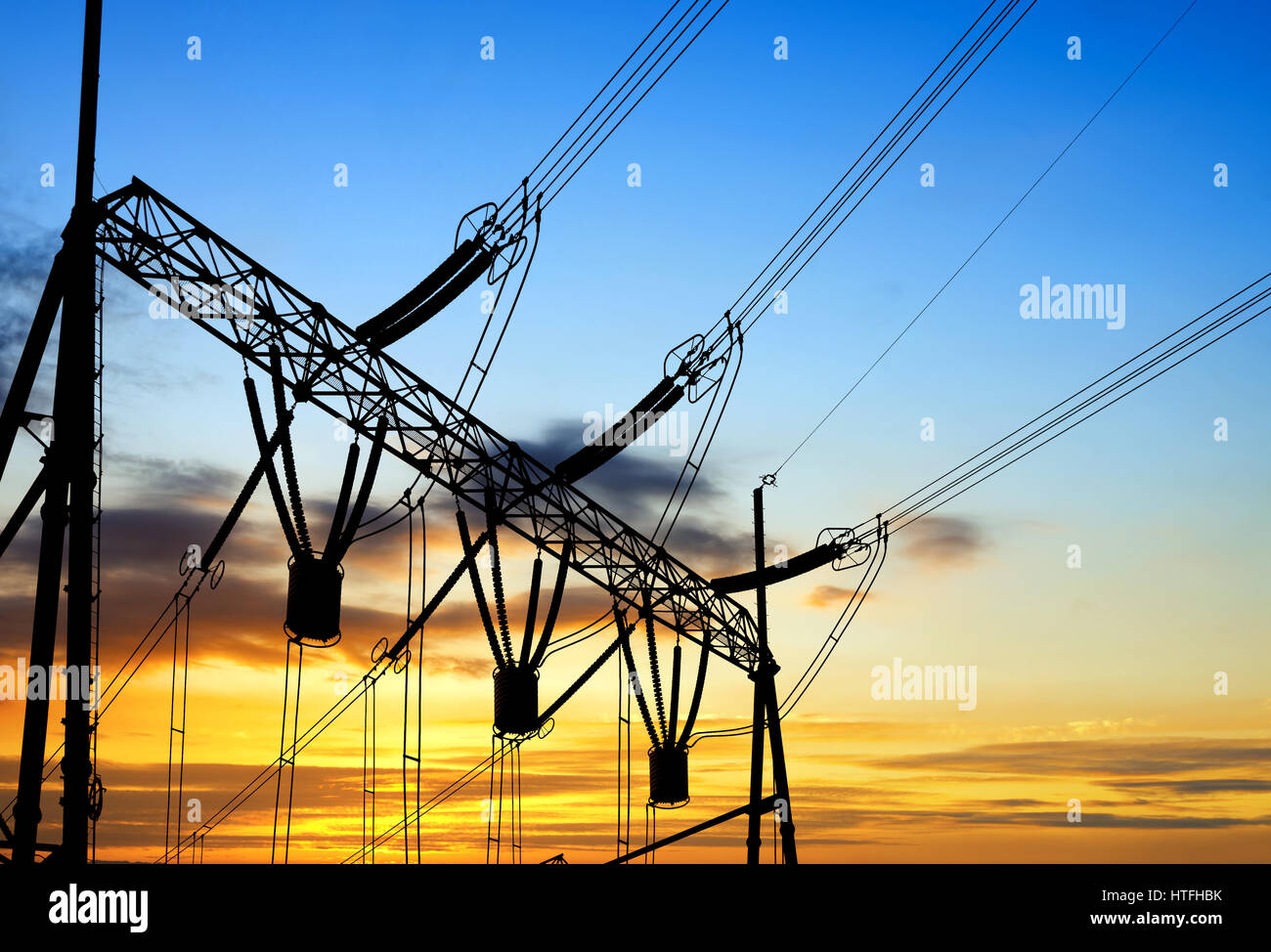 Converter station under dusk sky, electrical equipment and wiring Stock