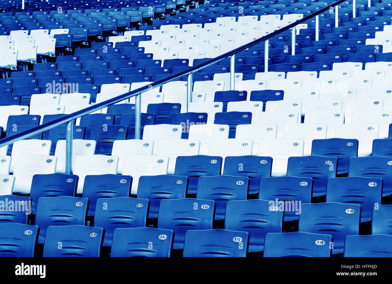 amphitheater of dark blue seats abstract background Stock Photo