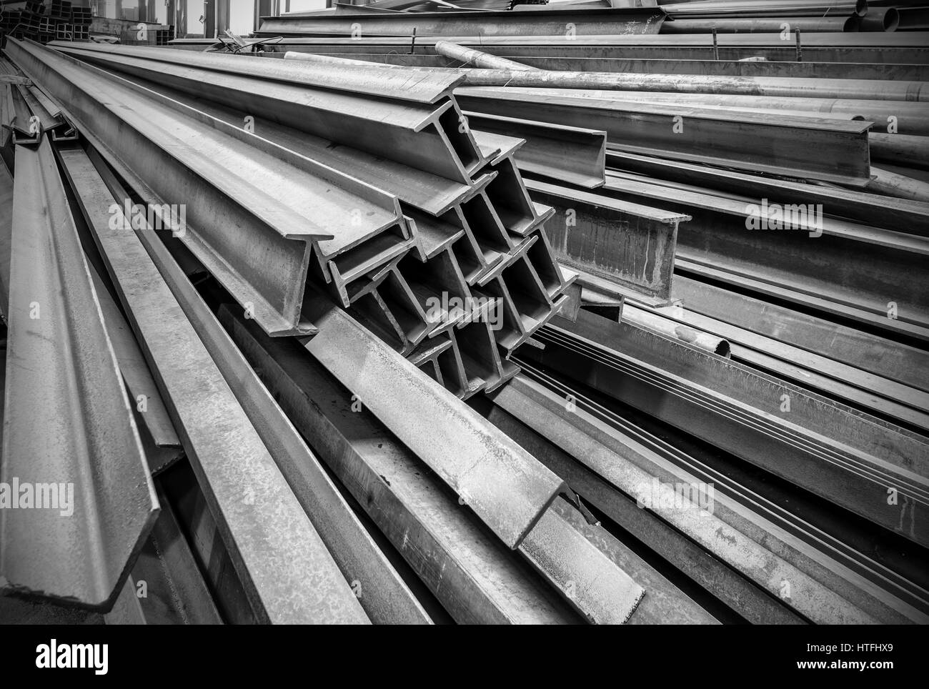Steel factory floor, stacked with a lot of steel Stock Photo