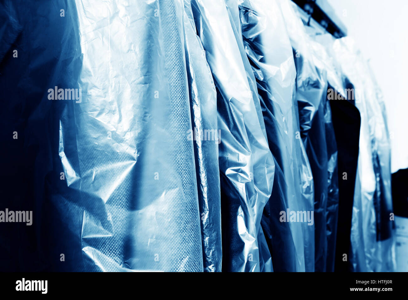 Laundry, hanging on the racks of old clothes Stock Photo - Alamy