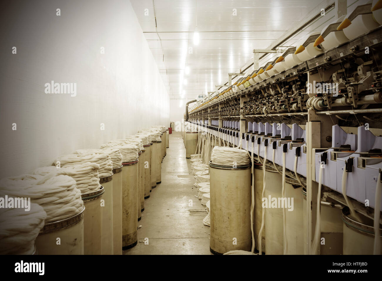 Closeup of machinery part at spinning factory Stock Photo Alamy