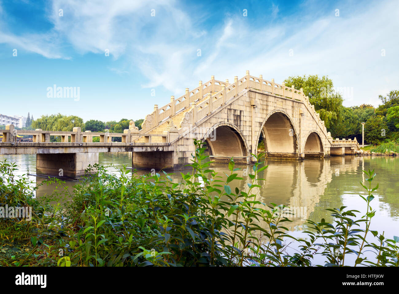 vintage bridge in beijing garden Stock Photo