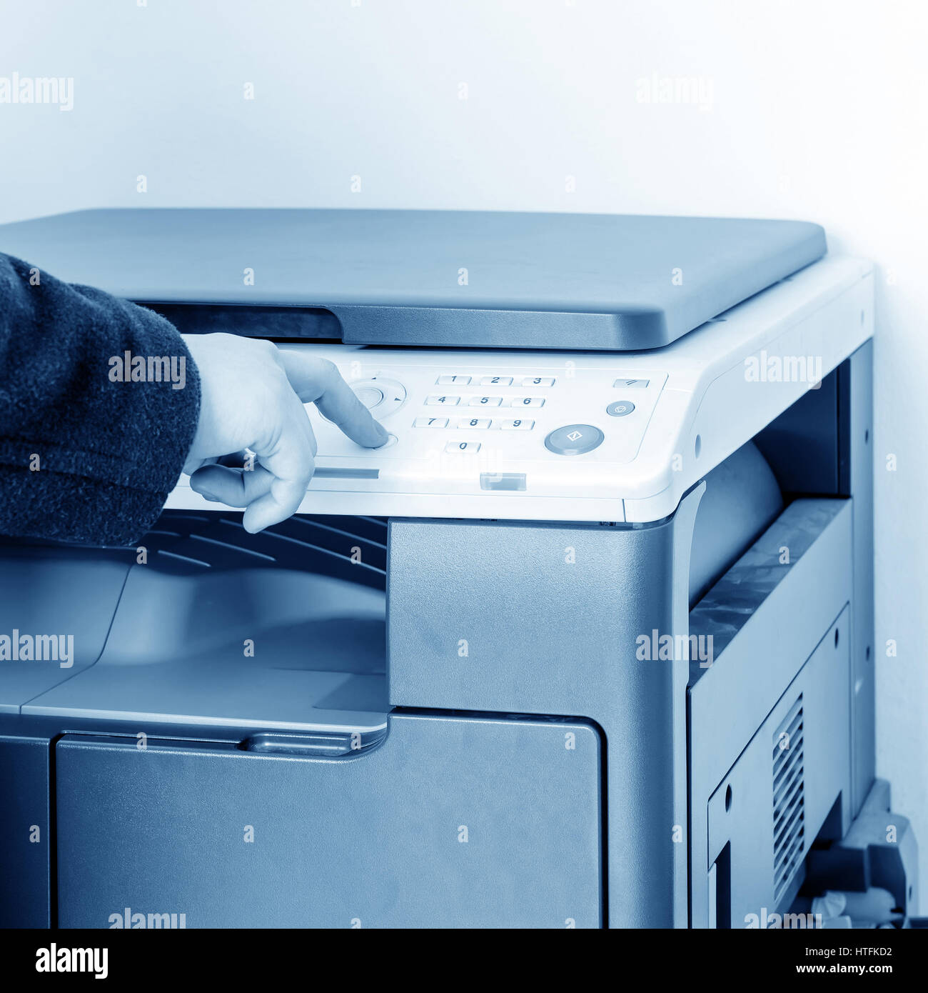 woman using copy machine Stock Photo - Alamy