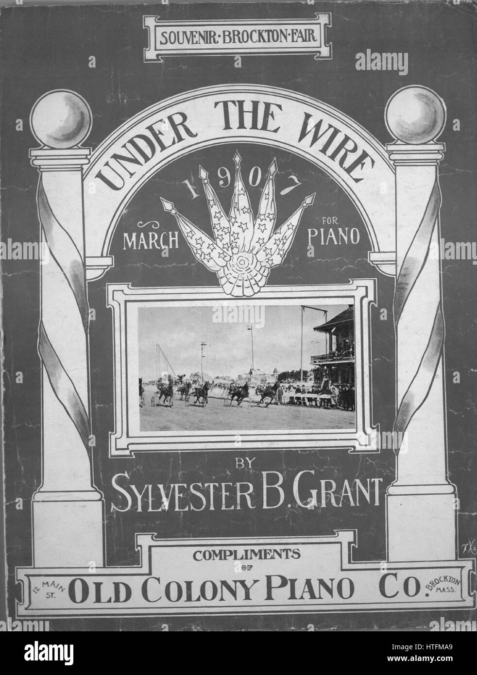Sheet music cover image of the song 'Under the Wire March for Piano', with original authorship notes reading 'By Slyvester B Grant', 1907. The publisher is listed as 'Compliments of Old Colony Piano Co. [Souvenir, Brockton Fair], 12 Main St.', the form of composition is 'sectional', the instrumentation is 'piano', the first line reads 'None', and the illustration artist is listed as '[unattributed photo of horse race in progress]; John Worley Co., Boston, Mass.'. Stock Photo