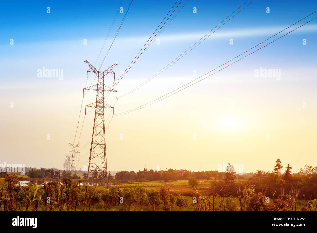 Cloudy sky electricity pylon hi-res stock photography and images - Alamy