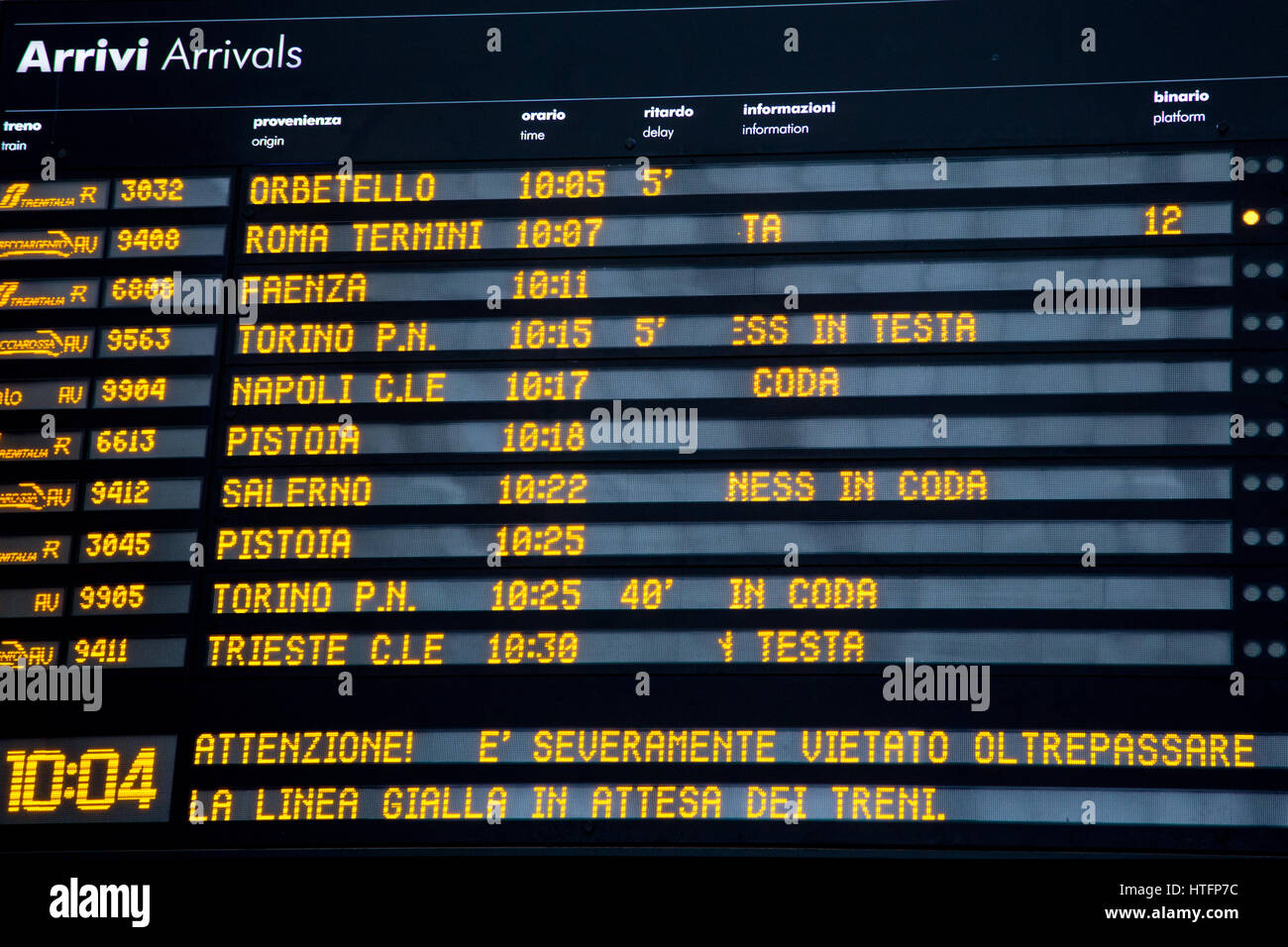 Arrivals board at Stazione di Santa Maria Novella in Florence showing train arrivals from a variety of destinations in Italy. Stock Photo