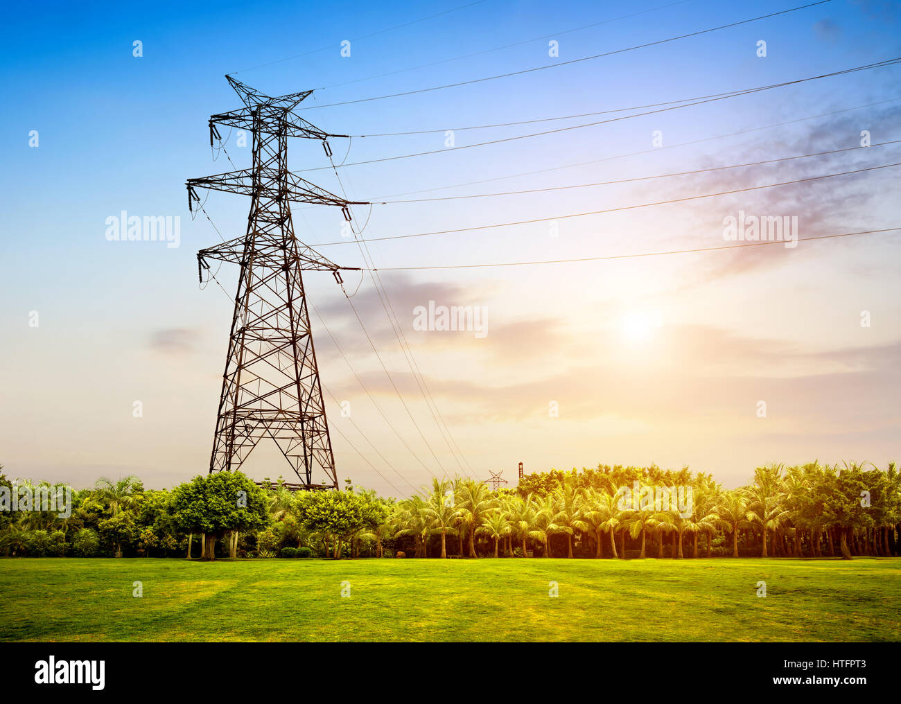 High voltage tower under sky background, dusk landscape Stock Photo - Alamy