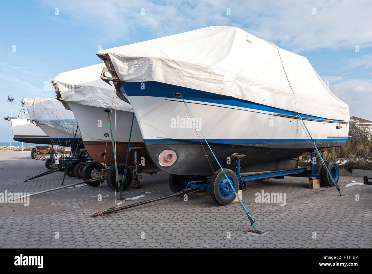 onshore stored motorboats Stock Photo