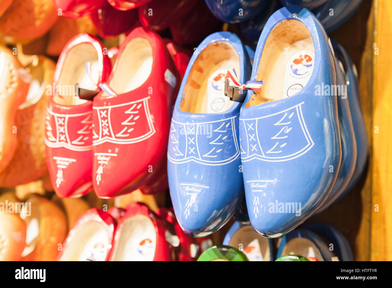 Zaanse Schans, Netherlands - February 25: Dutch clogs made of poplar wood, traditional shoes for everyday use stand on souvenir shop counter Stock Photo