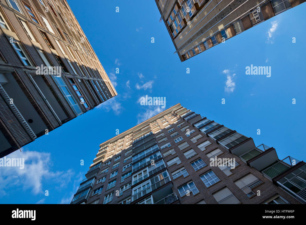 One point perspective of three residential building with a blue sky in Guipuzcoa (Basque country, Spain) 2017. Stock Photo