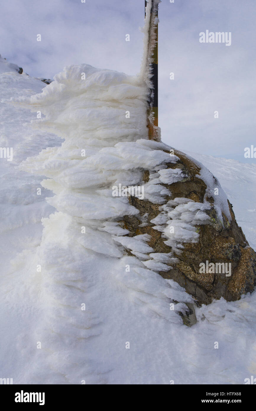 Frozen metal pylon in winter mountain Stock Photo - Alamy