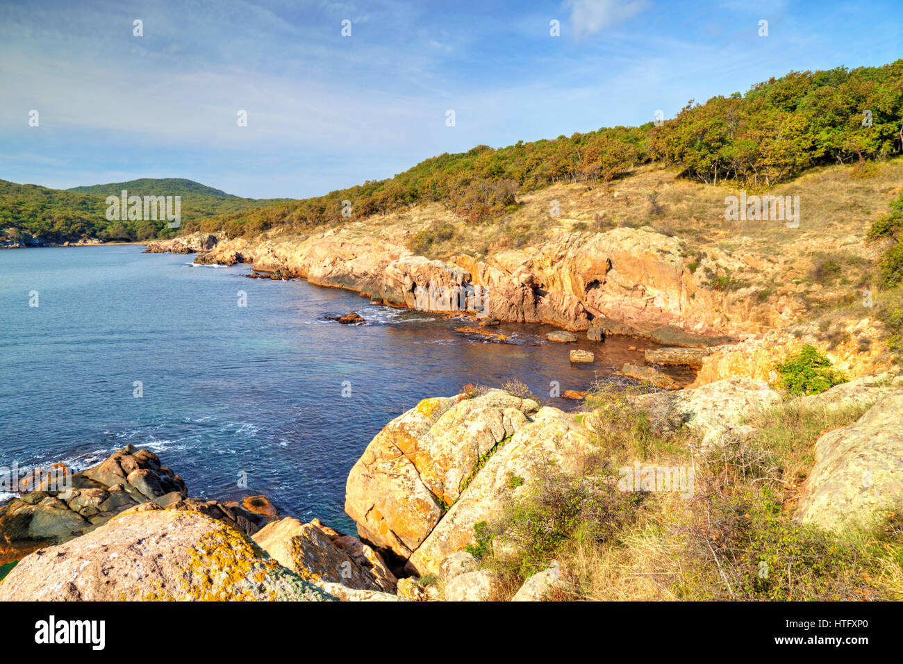Beautiful landscape on rocky shore Stock Photo - Alamy
