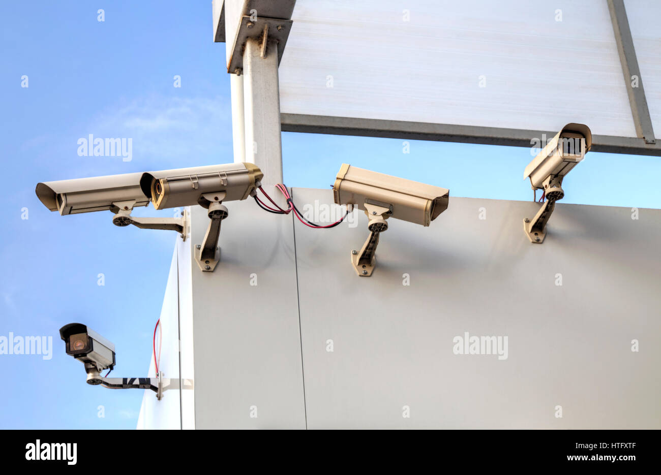 Security cameras on the wall Stock Photo Alamy