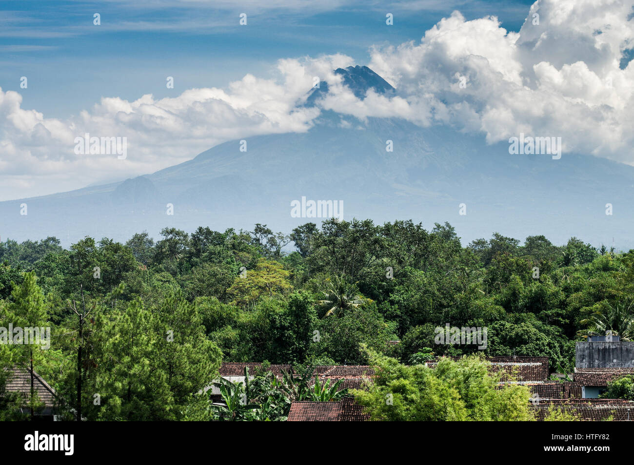 View of Gunung Merapi volcano from central Yogyakarta - Java, Indonesia Stock Photo