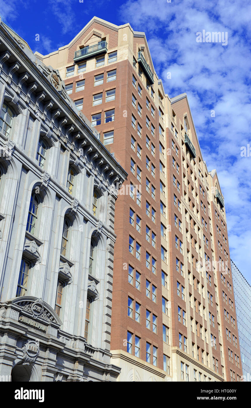 Buildings and skyscrapers with blue sky in urban setting Stock Photo ...