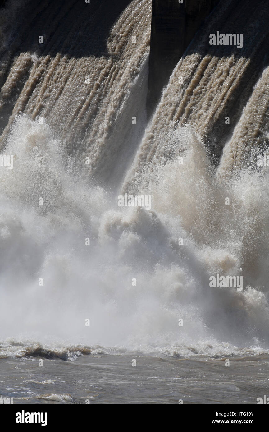 Water splashes at the bottom of a Morony Dam spillway.  The Missouri River was running at 23,000 cfs.  Median flow May 28th is 12,400 cfs Stock Photo