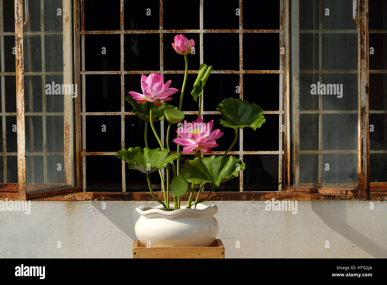 Artificial flower, handmade lotus flower with green leaf and pink petal make from clay, diy art