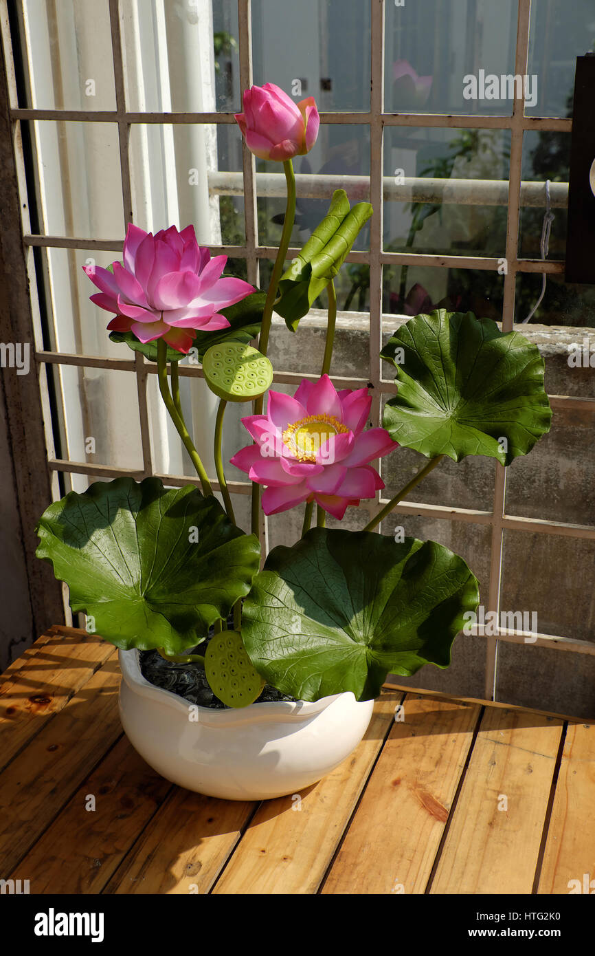 Artificial flower, handmade lotus flower with green leaf and pink petal make from clay, diy art