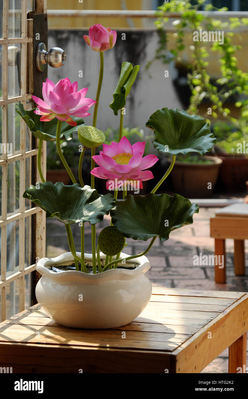 Artificial flower, handmade lotus flower with green leaf and pink petal make from clay, diy art