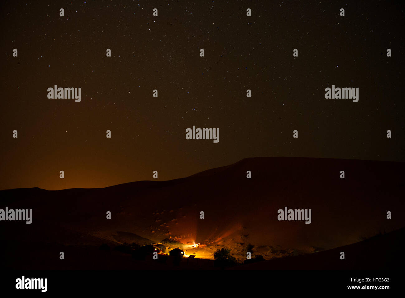 A beautiful starry sky over a Berber camp in the Sahara Desert, Morocco Stock Photo