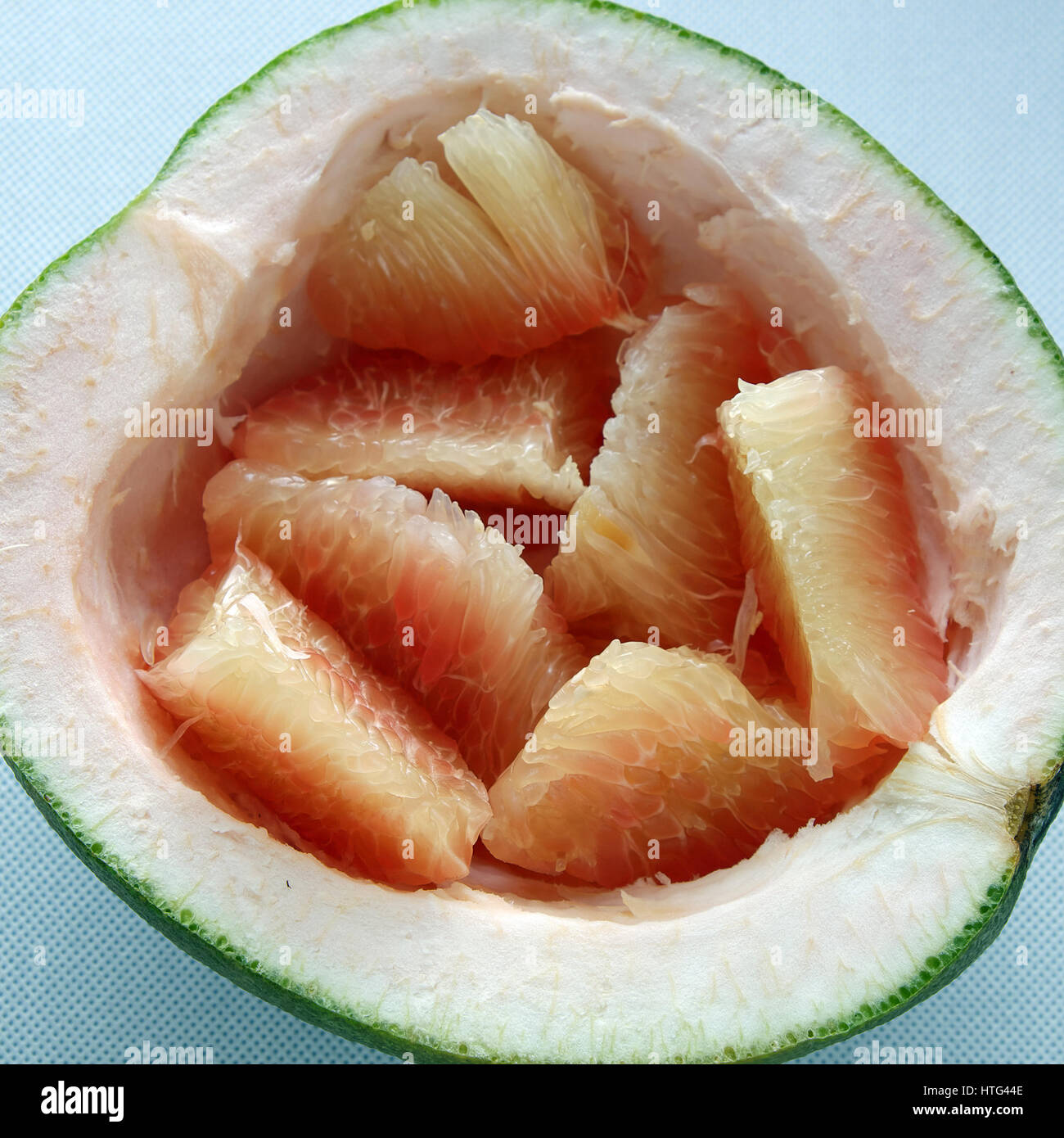Grapefruit on white background, tropical fruit, rich vitamin A, healthy eating, reduce
