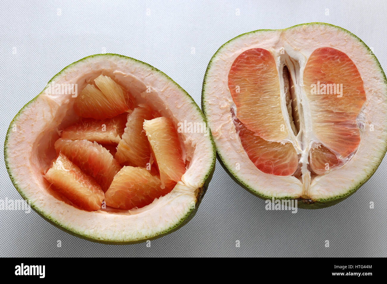 Grapefruit on white background, tropical fruit, rich vitamin A, healthy