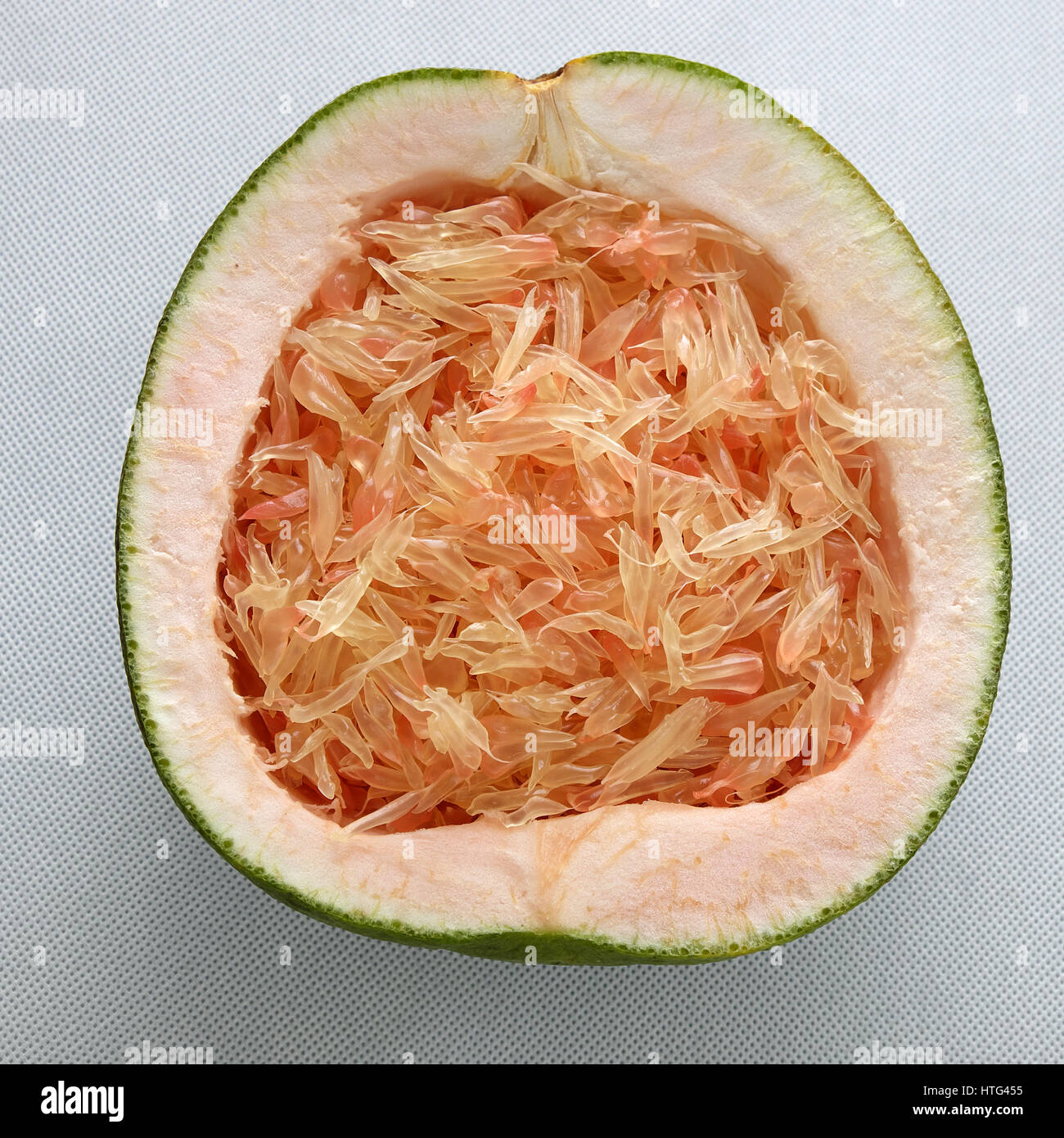 Grapefruit on white background, tropical fruit, rich vitamin A, healthy