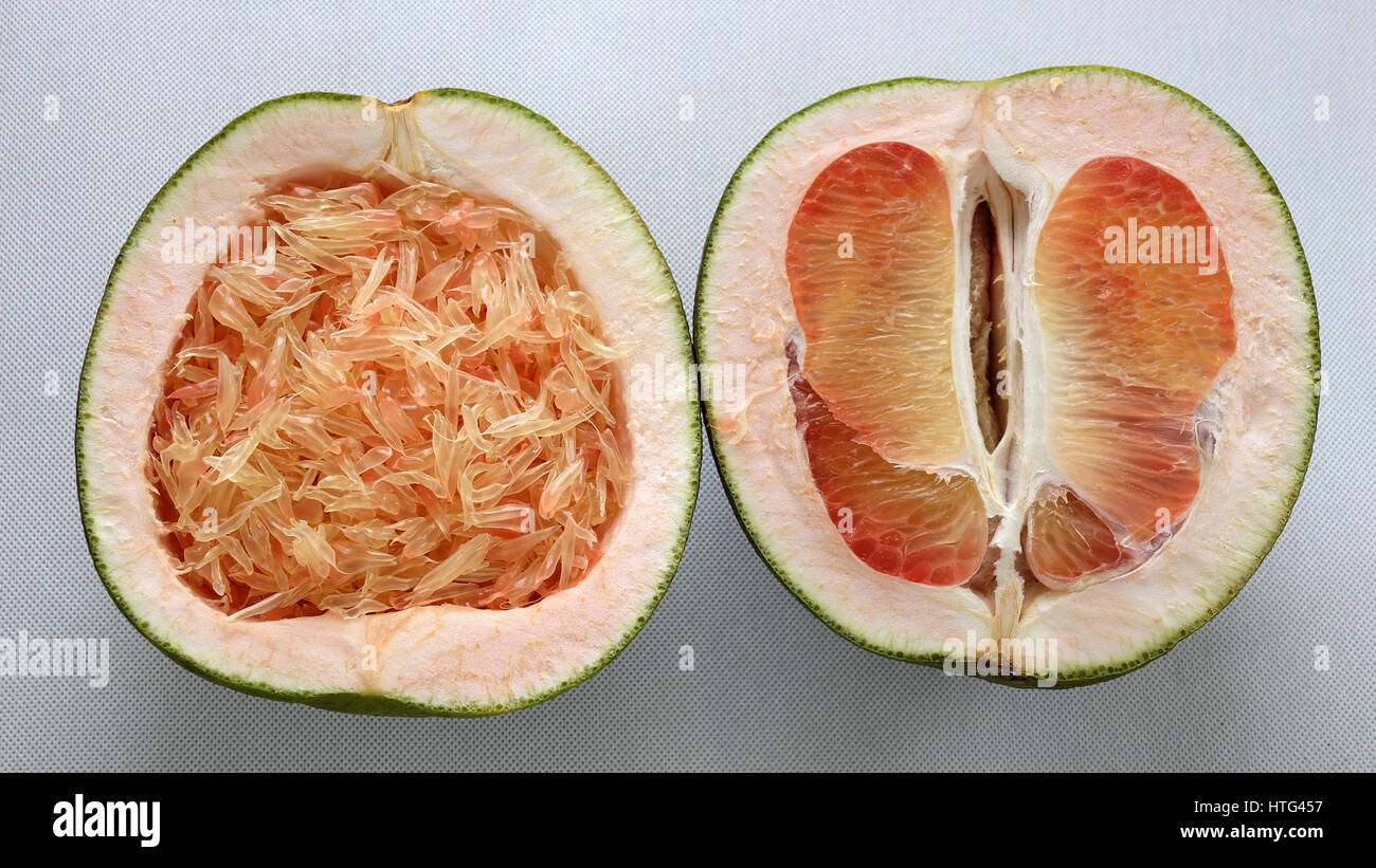Grapefruit on white background, tropical fruit, rich vitamin A, healthy