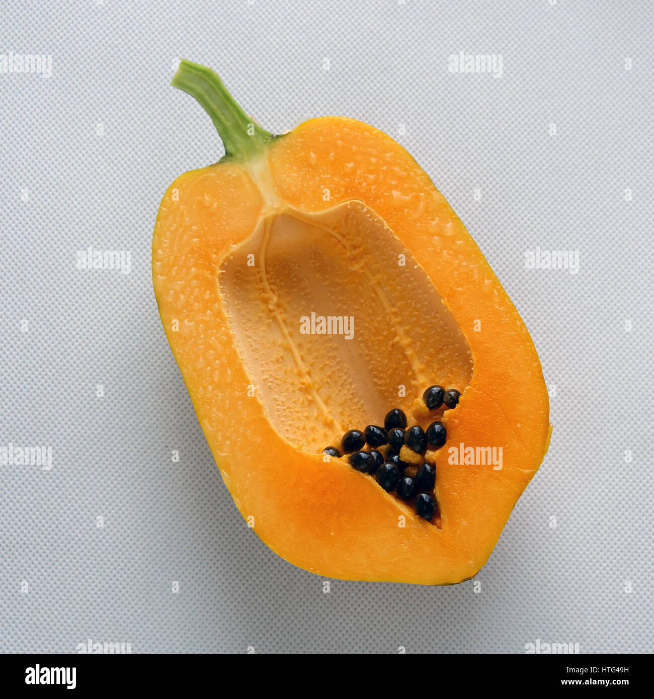 Papaya on white background, tropical fruit, rich fiber, vitamin A,C ,E