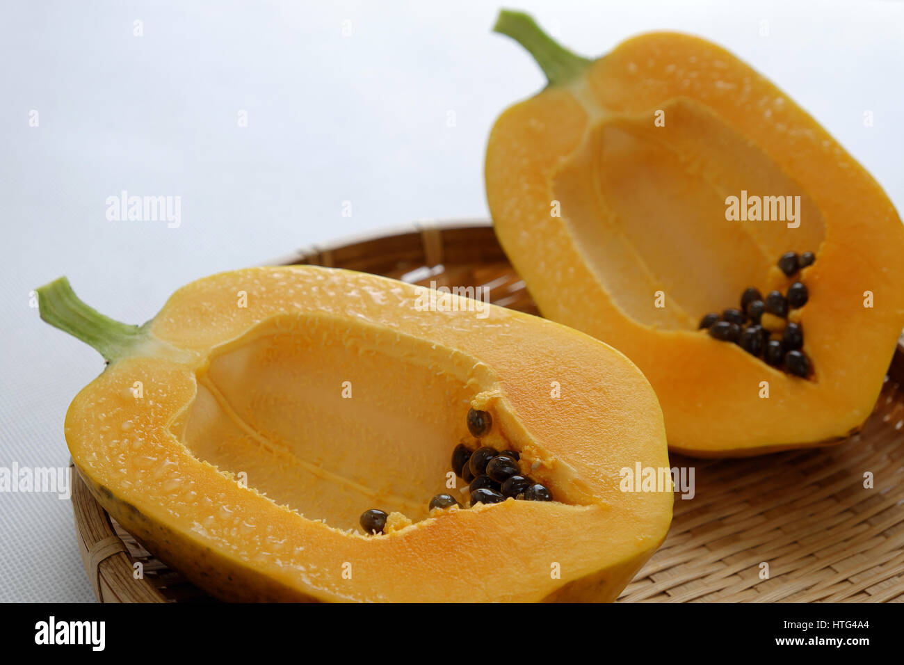 Papaya on white background, tropical fruit, rich fiber, vitamin A,C ,E