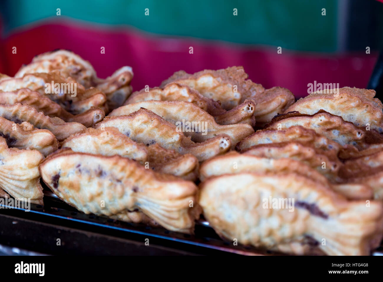 very famous street food in south korea : fish shaped pancake filled in sweet red been. Stock Photo