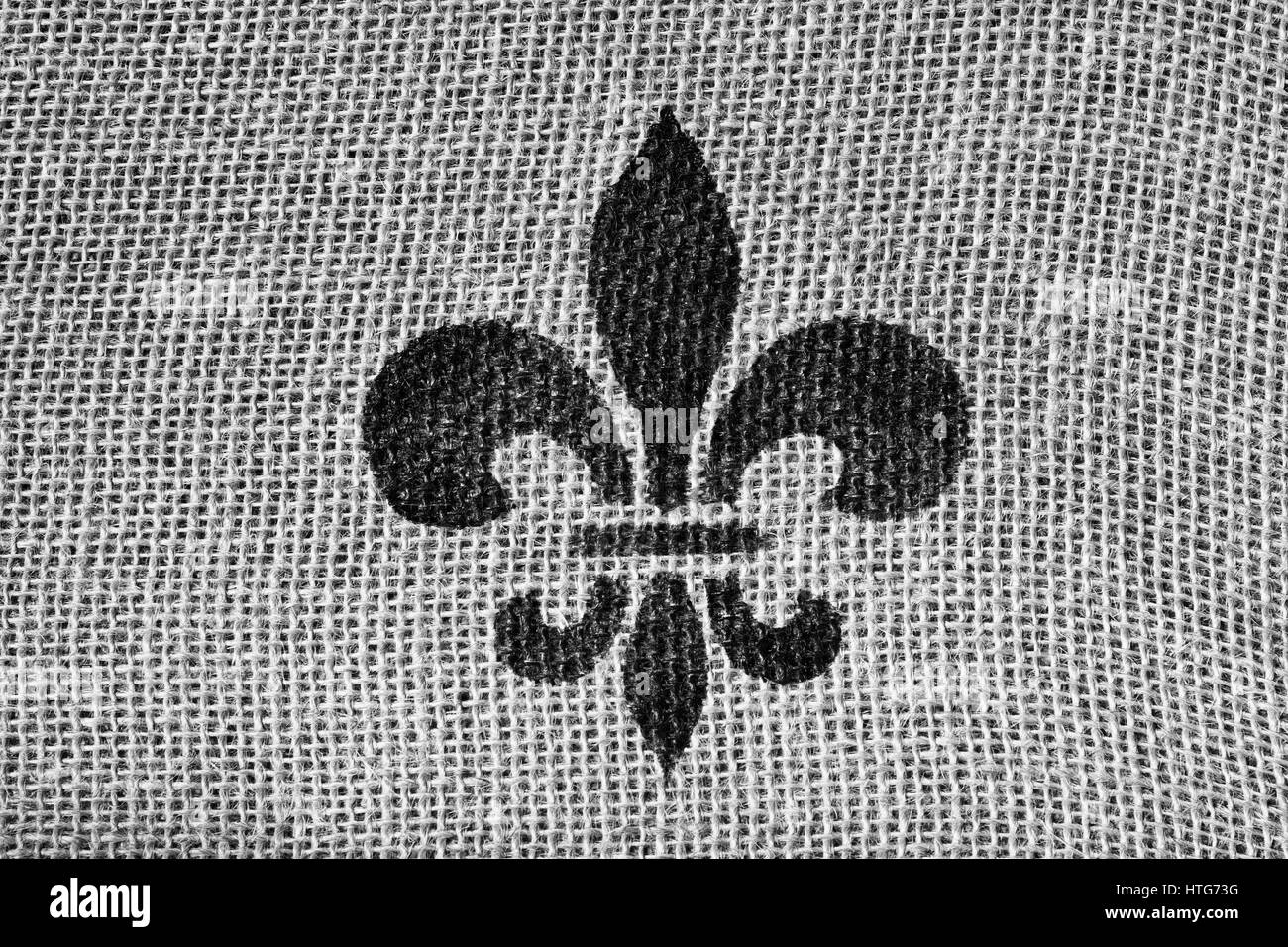 Fleur de Lis on Burlap in Black and White Stock Photo