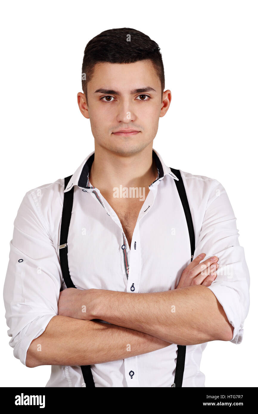 A handsome man in suspenders. Isolated on white background Stock Photo