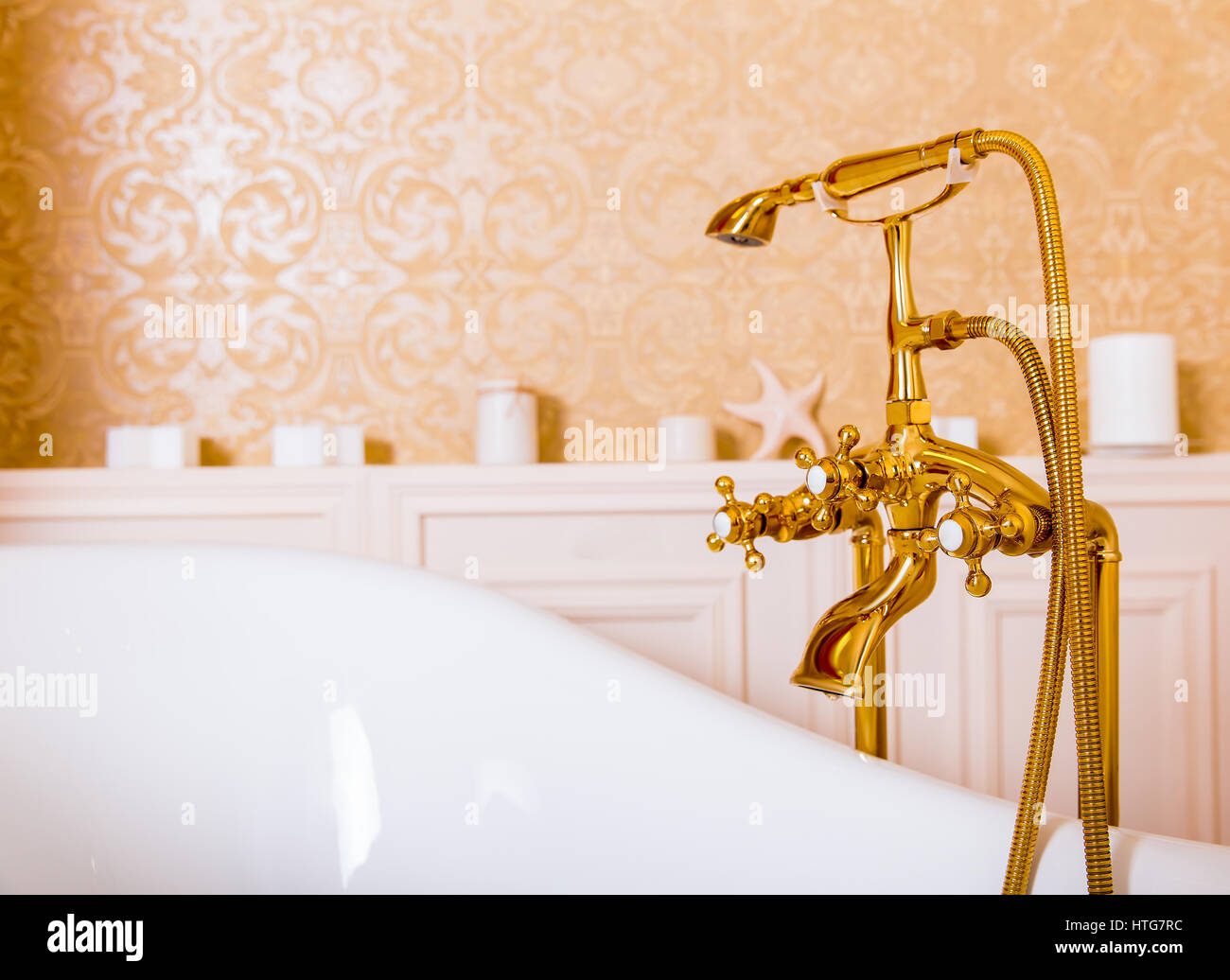 Rich Gold Faucet And White Bath In The Bathroom Luxury Sanitary